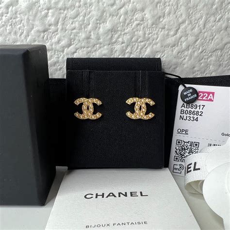 chanel logo stud earrings cheap|chanel cc logo earrings.